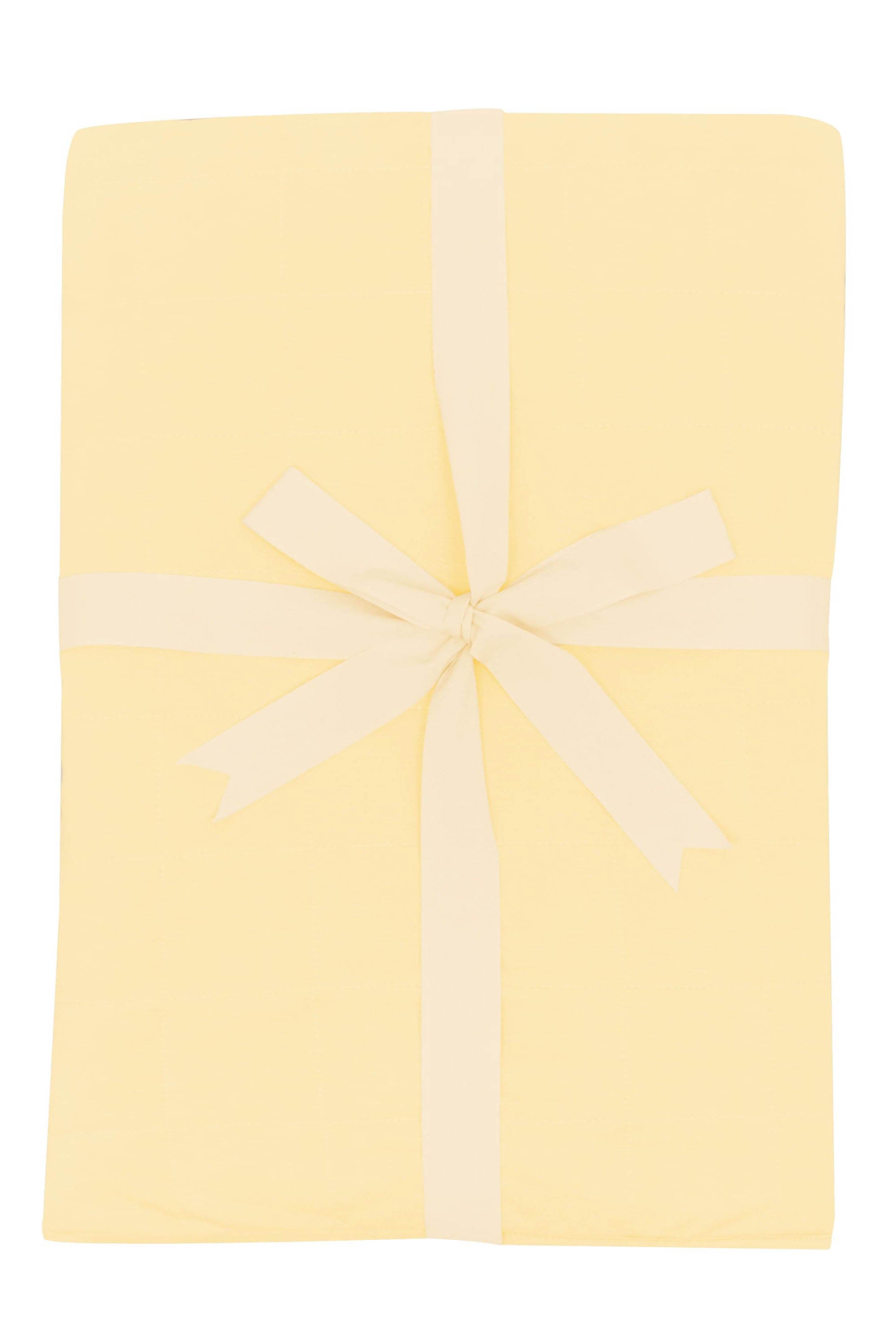 Kyte Baby's Throw Blanket in Lilikoi 1.0