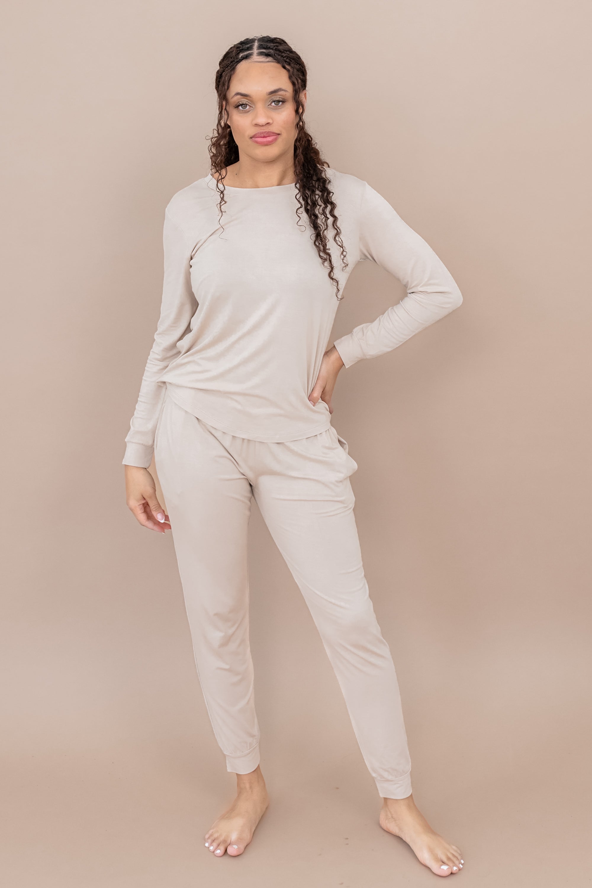 Woman in matching bamboo loungewear set in color Bisque