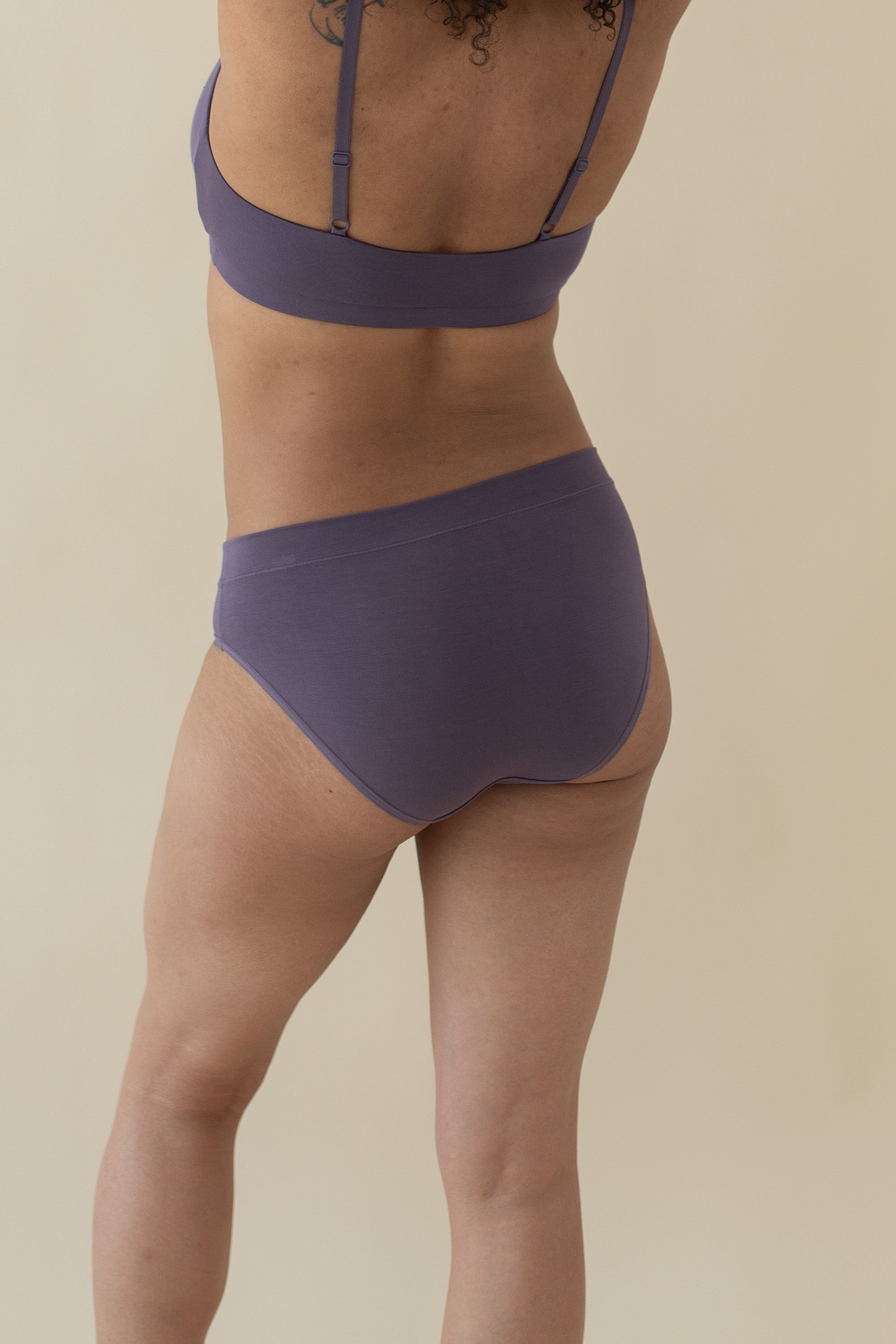 Woman modeling Women's Midi Brief in Currant showing back