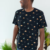 Man modeling Men's Crew Neck Tee in Under the Stars looking off to the side