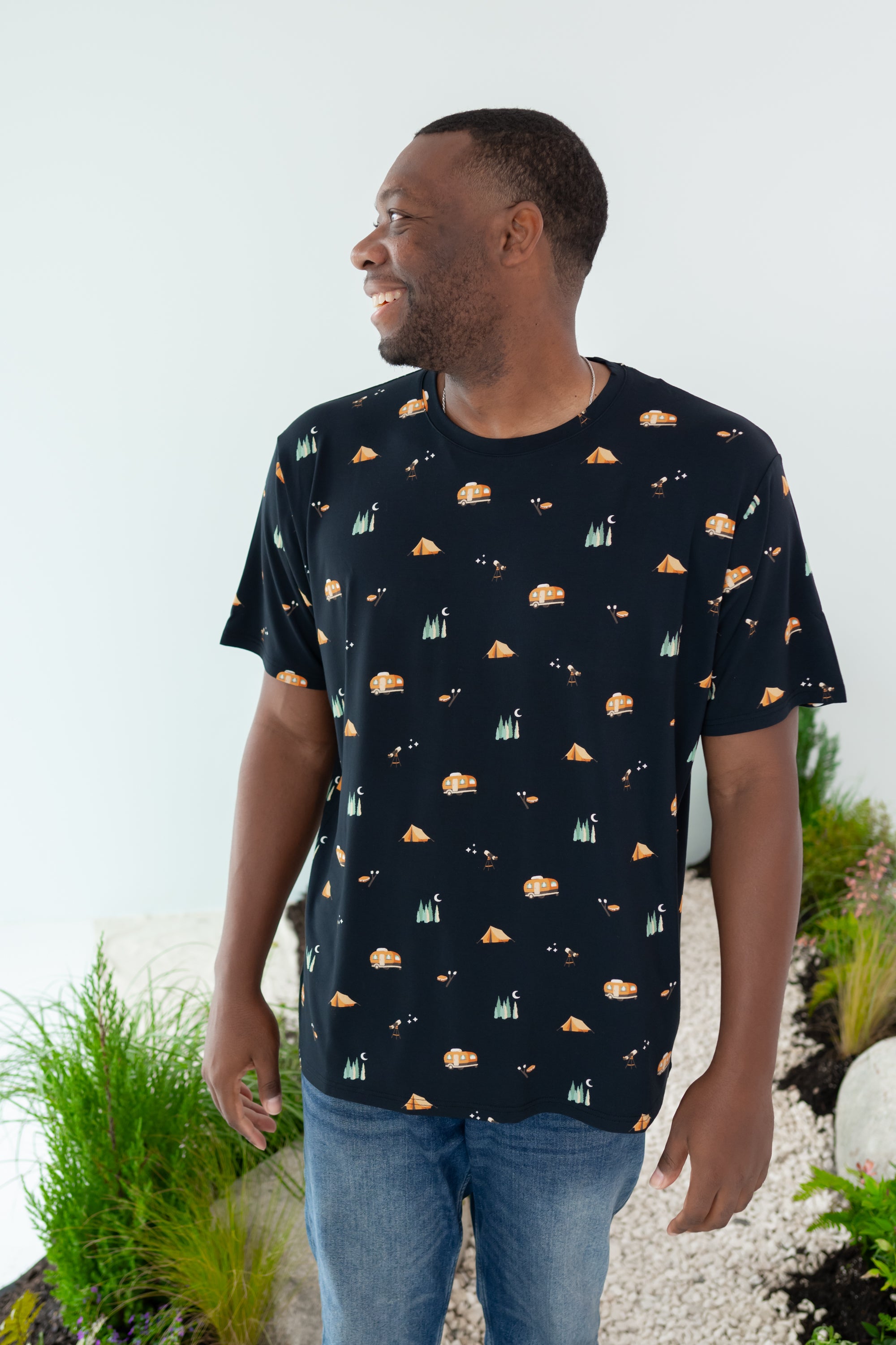 Man modeling Men's Crew Neck Tee in Under the Stars looking off to the side