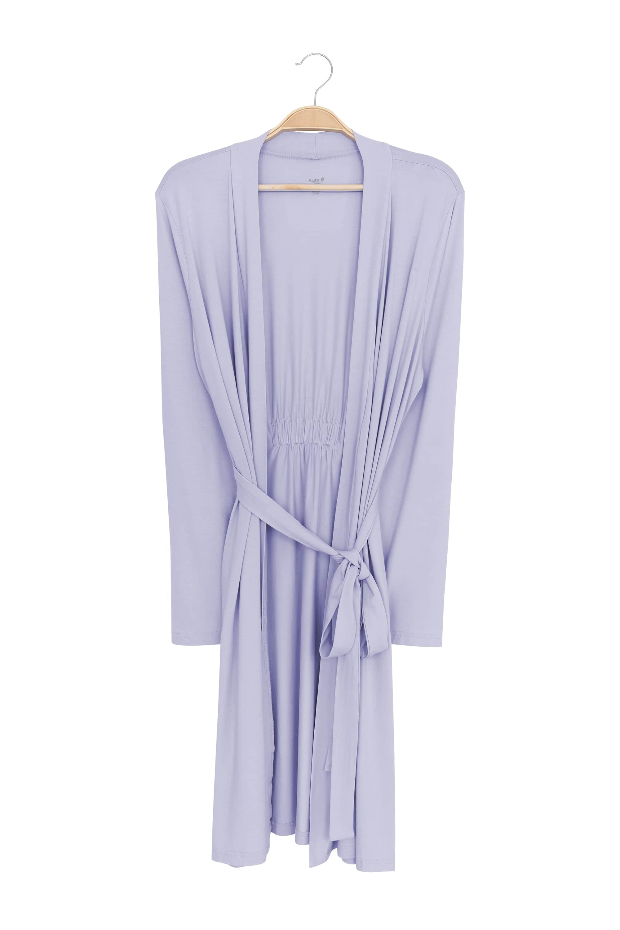 Light purple robe on a hanger against a white background