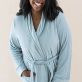 Smiling model wearing the Adult Robe in Fog