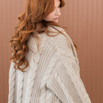 Close up of back of Chunky Knit Cable Cardigan in Almond