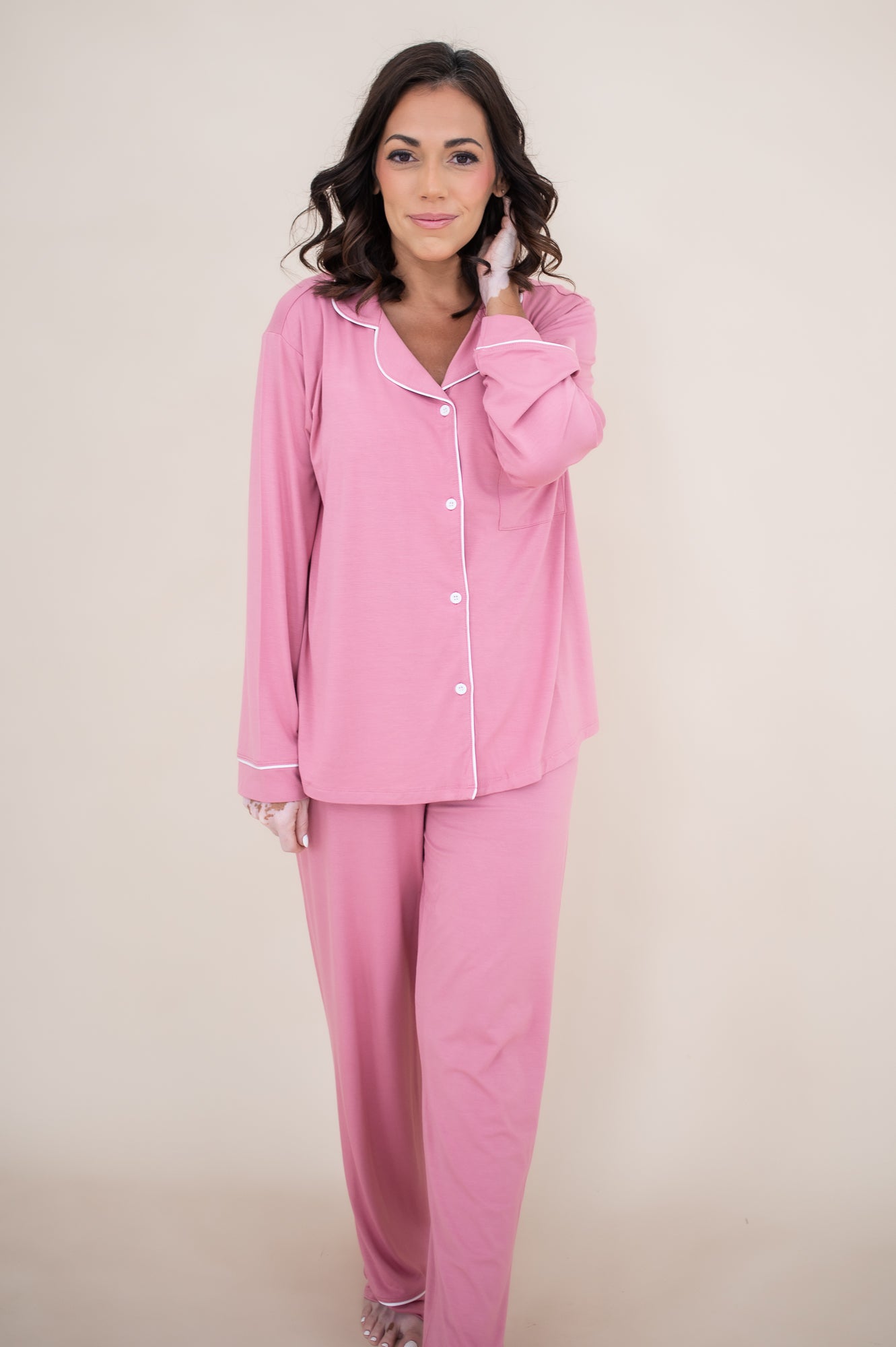 Model wearing the Long Sleeve Pajama Set in Apple Blossom with Cloud Trim