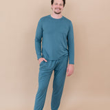 Smiling male model wearing Men's Jogger Set in Atlantic