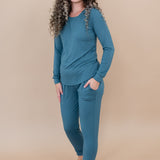Smiling wearing the Women's Jogger Set in Atlantic with hand in pocket