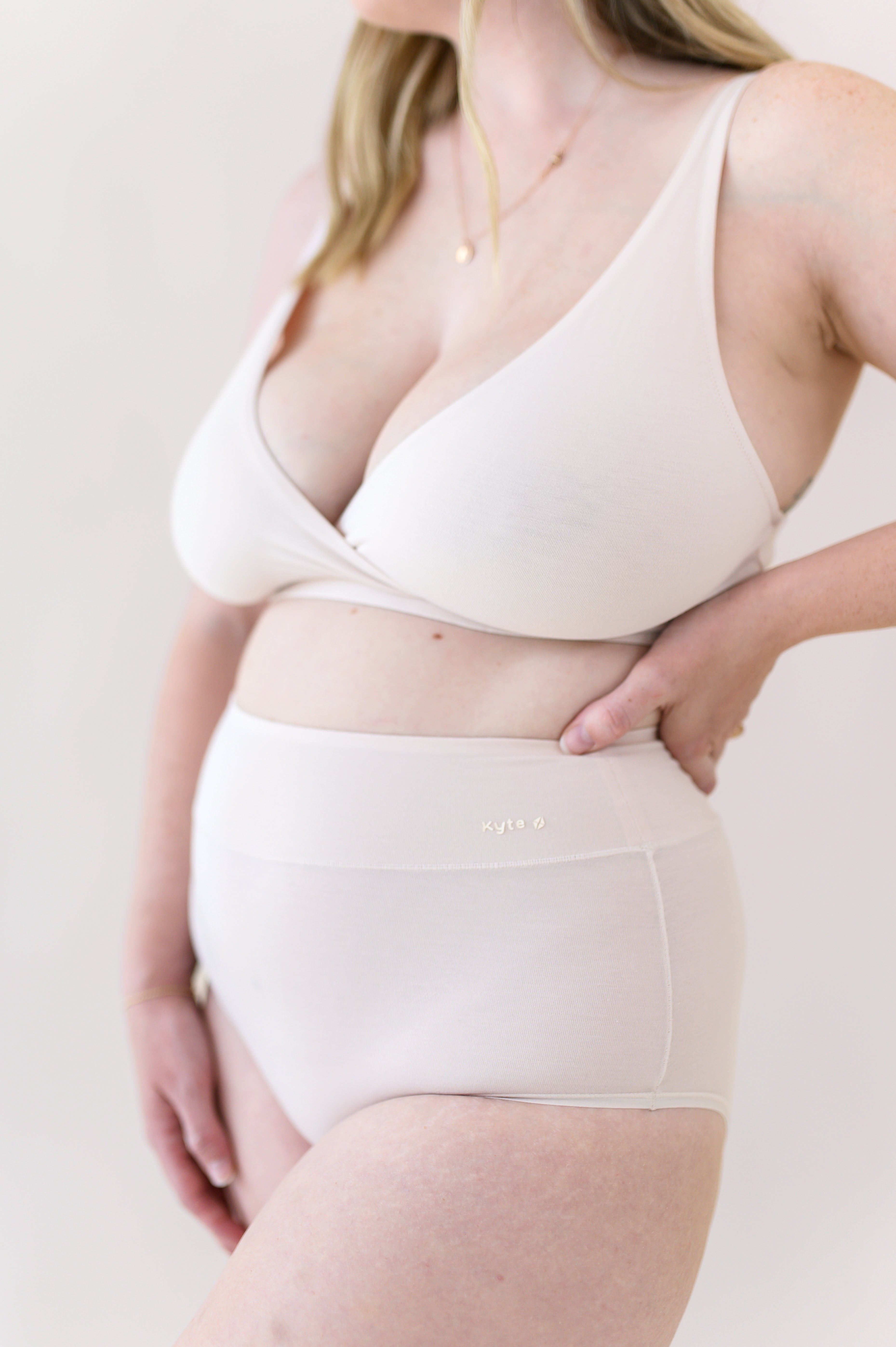 Woman modeling Women's High-Waisted Brief in Blonde and Cross Front Bralette