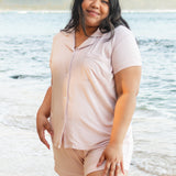 Female model on the beach wearing Women's Short Sleeve Pajama Set in Blush with Cloud Trim
