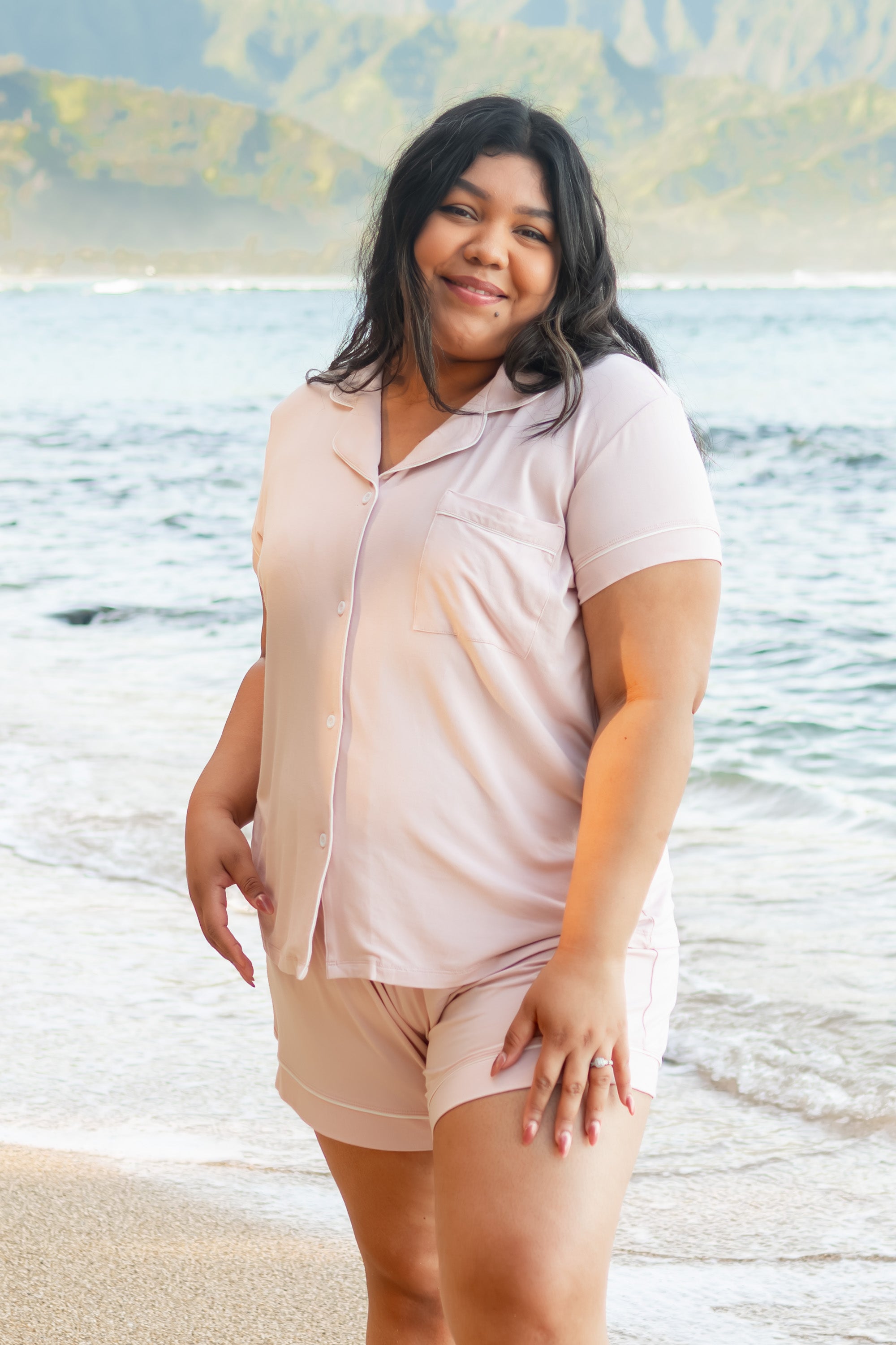 Female model on the beach wearing Women's Short Sleeve Pajama Set in Blush with Cloud Trim