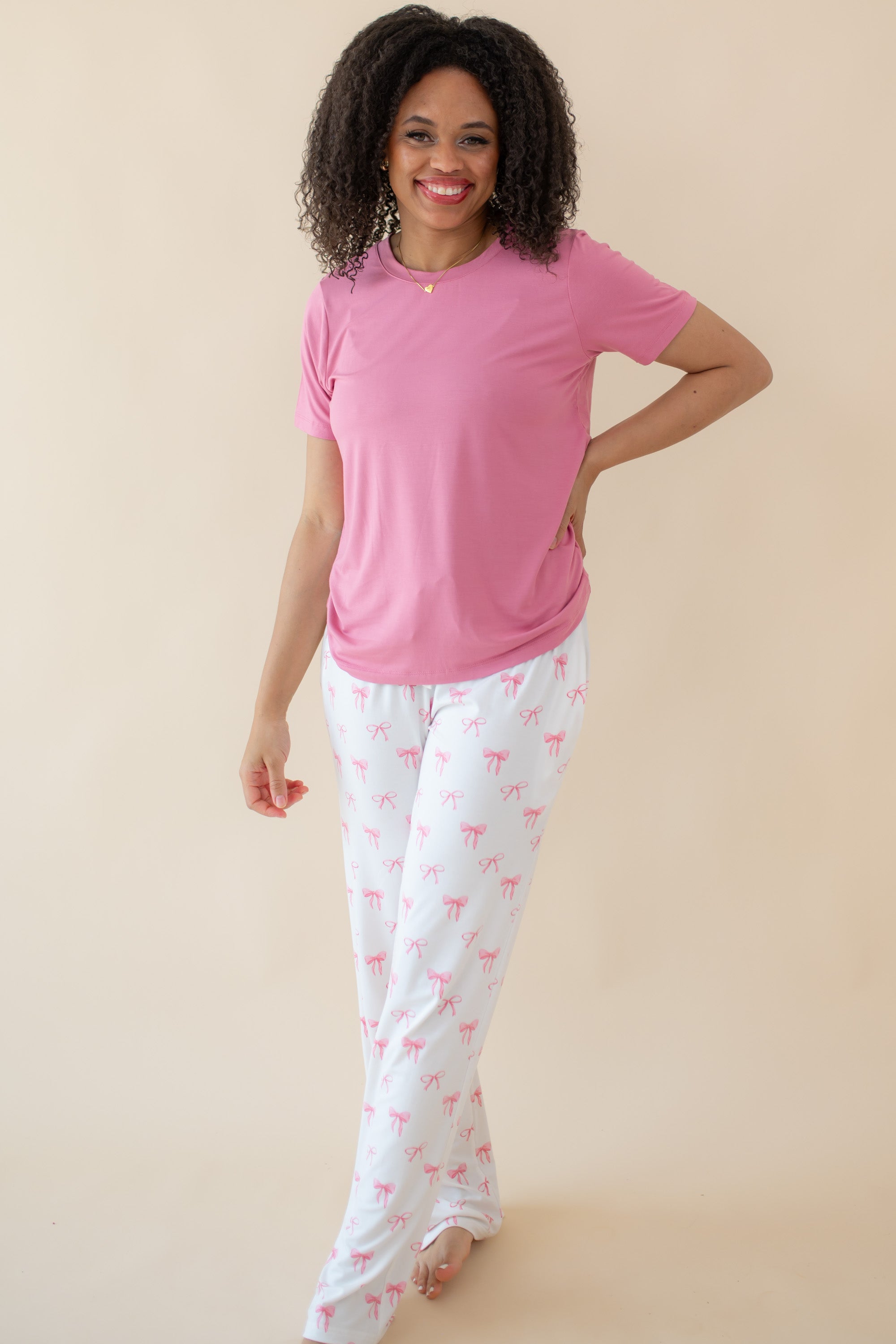 Woman modeling Women's Lounge Pants in Bow and Apple Blossom tee