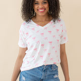 Woman modeling Women’s Relaxed Fit V-Neck in Bow and jean shorts