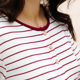 Close up of the Henley top and buttons on the Women's RIbbed Henley Set in Burgundy Stripe