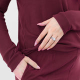 Close up of the pocket and waistband on the pants of the Women’s Ribbed Henley Set in Burgundy