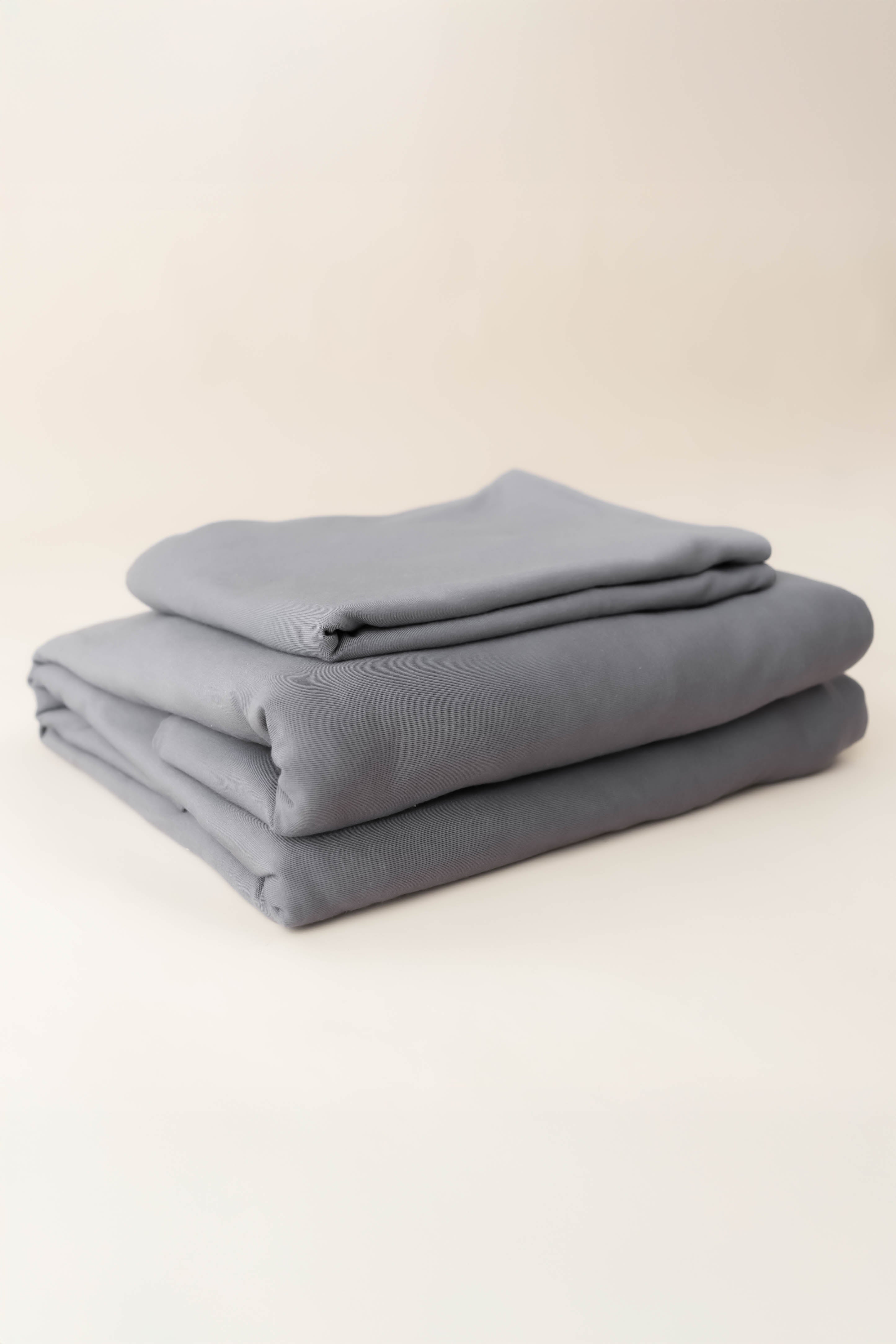 Kyte Baby's Fitted Sheet with Pillowcases in Charcoal
