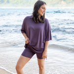 Woman wearing Women’s purple Biker Short Set in Currant
