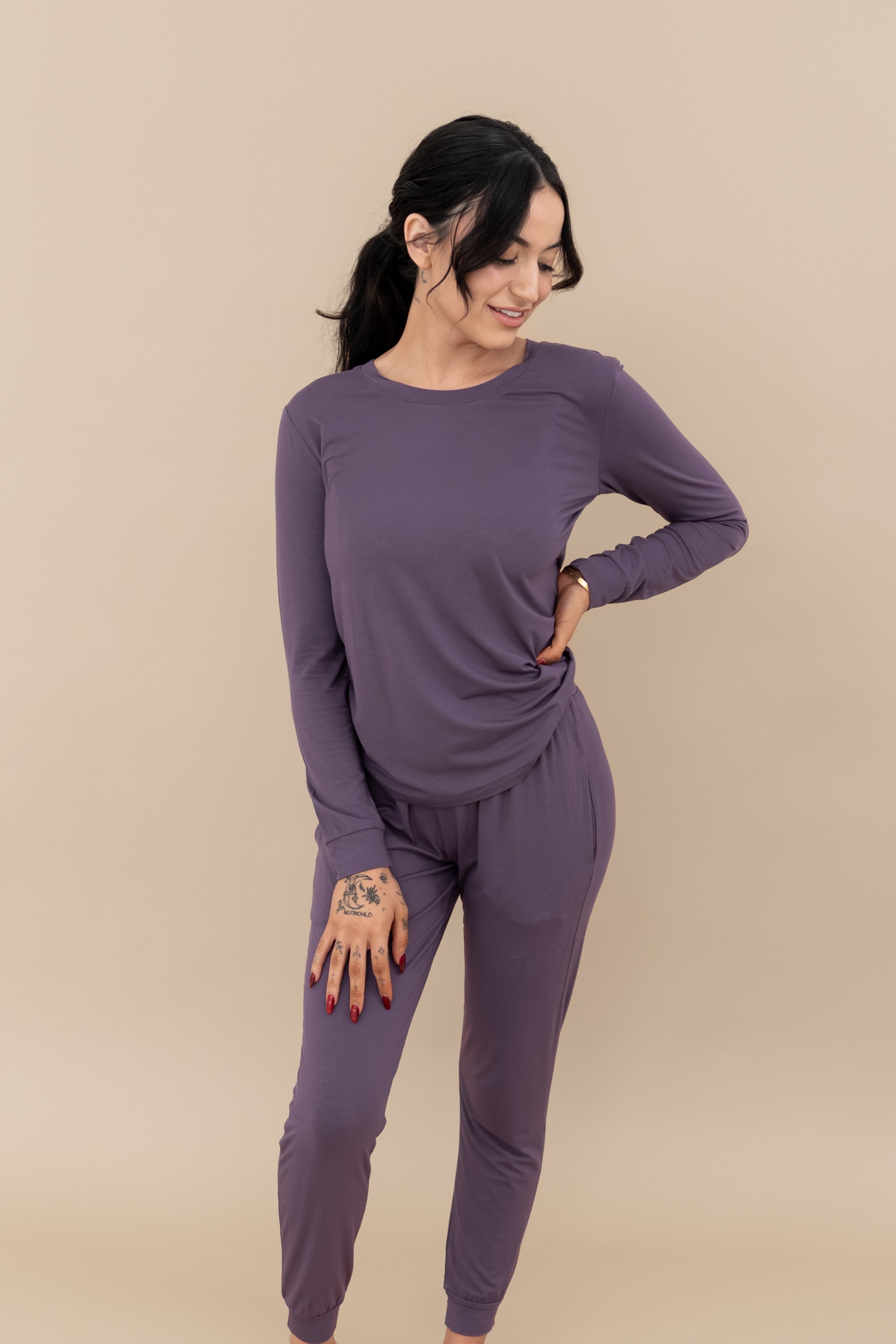 Female model in the Women's Jogger Pajama Set in Currant