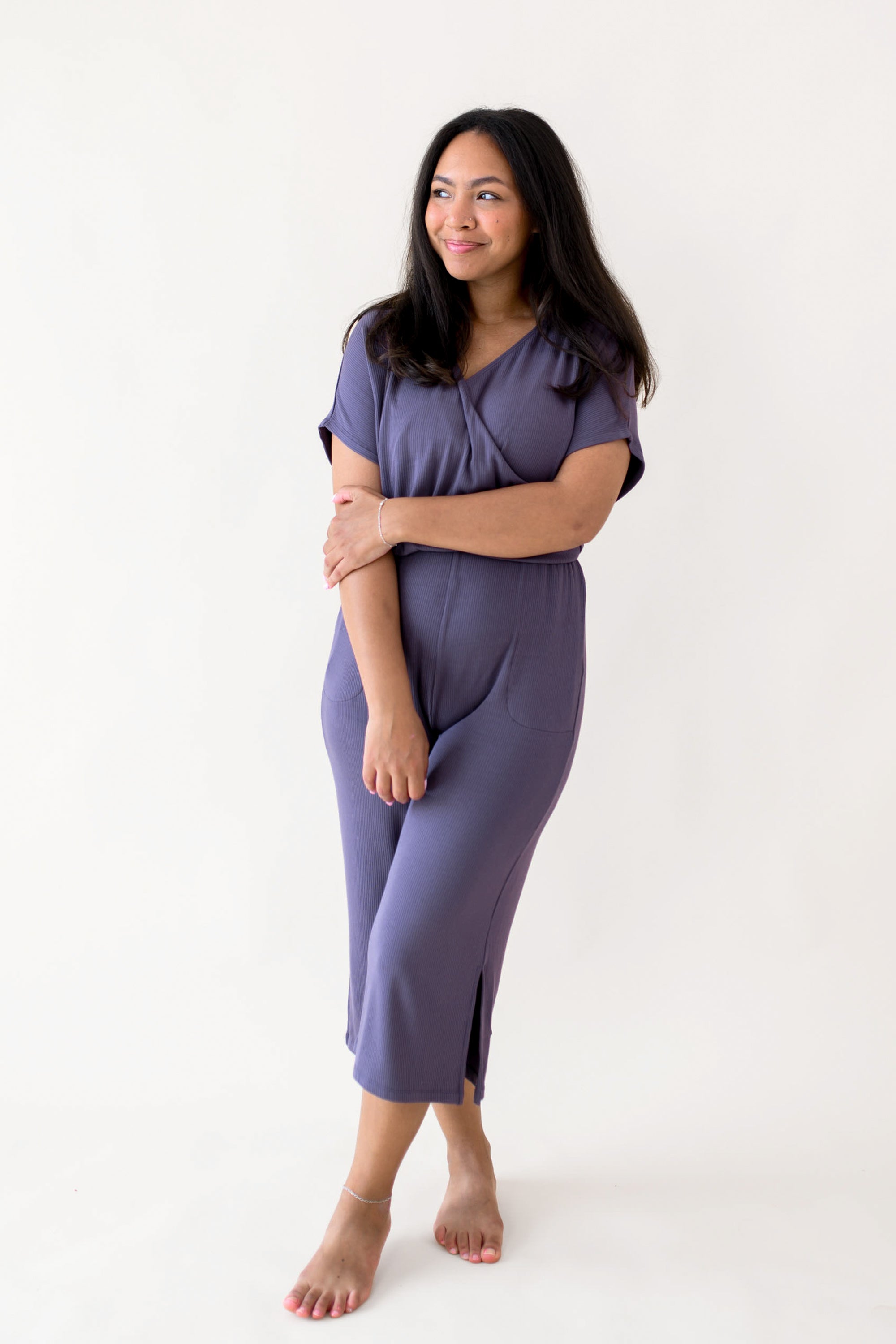 Woman modeling Women's Ribbed Jumpsuit in Currant