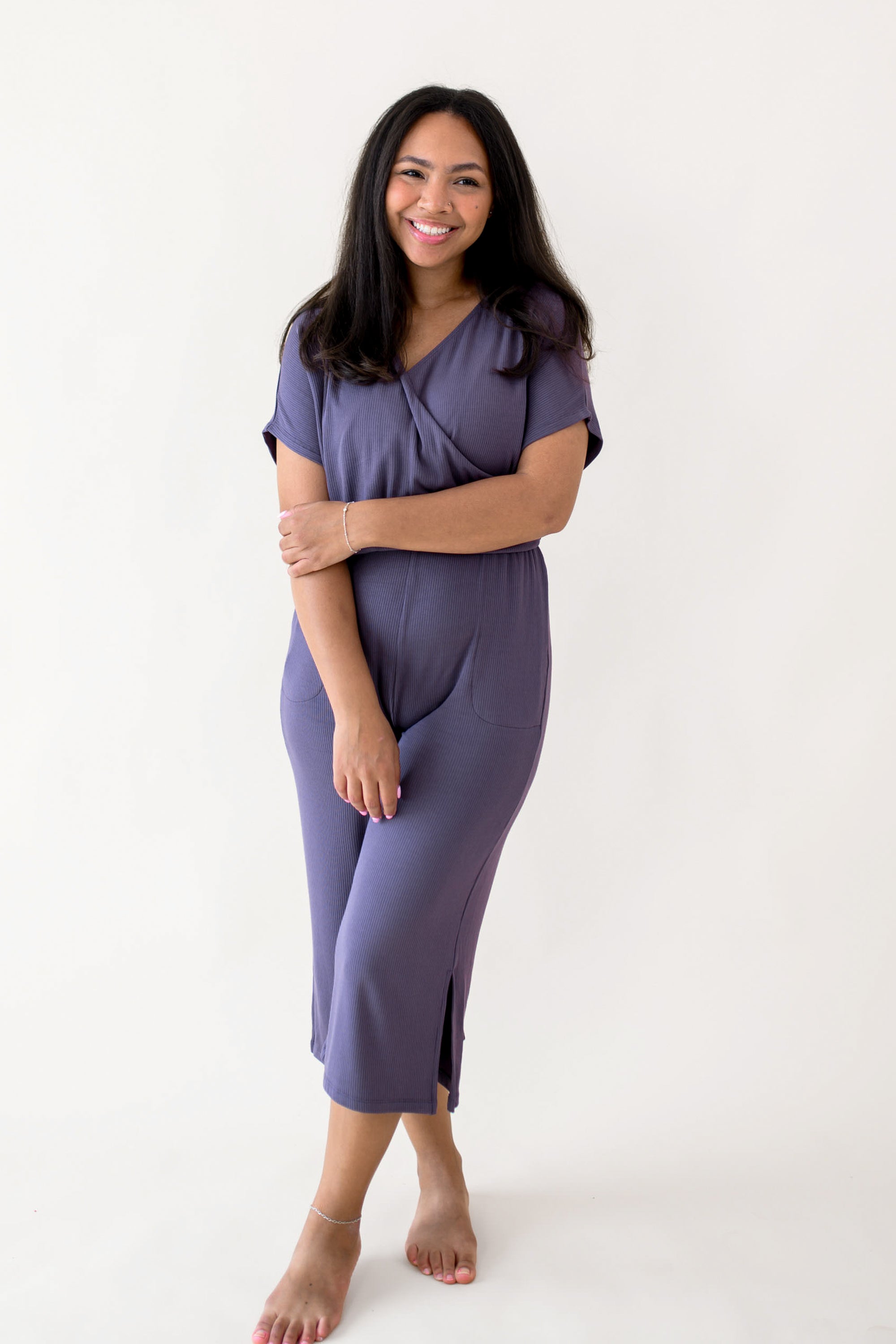 Woman modeling Women's Ribbed Jumpsuit in Currant