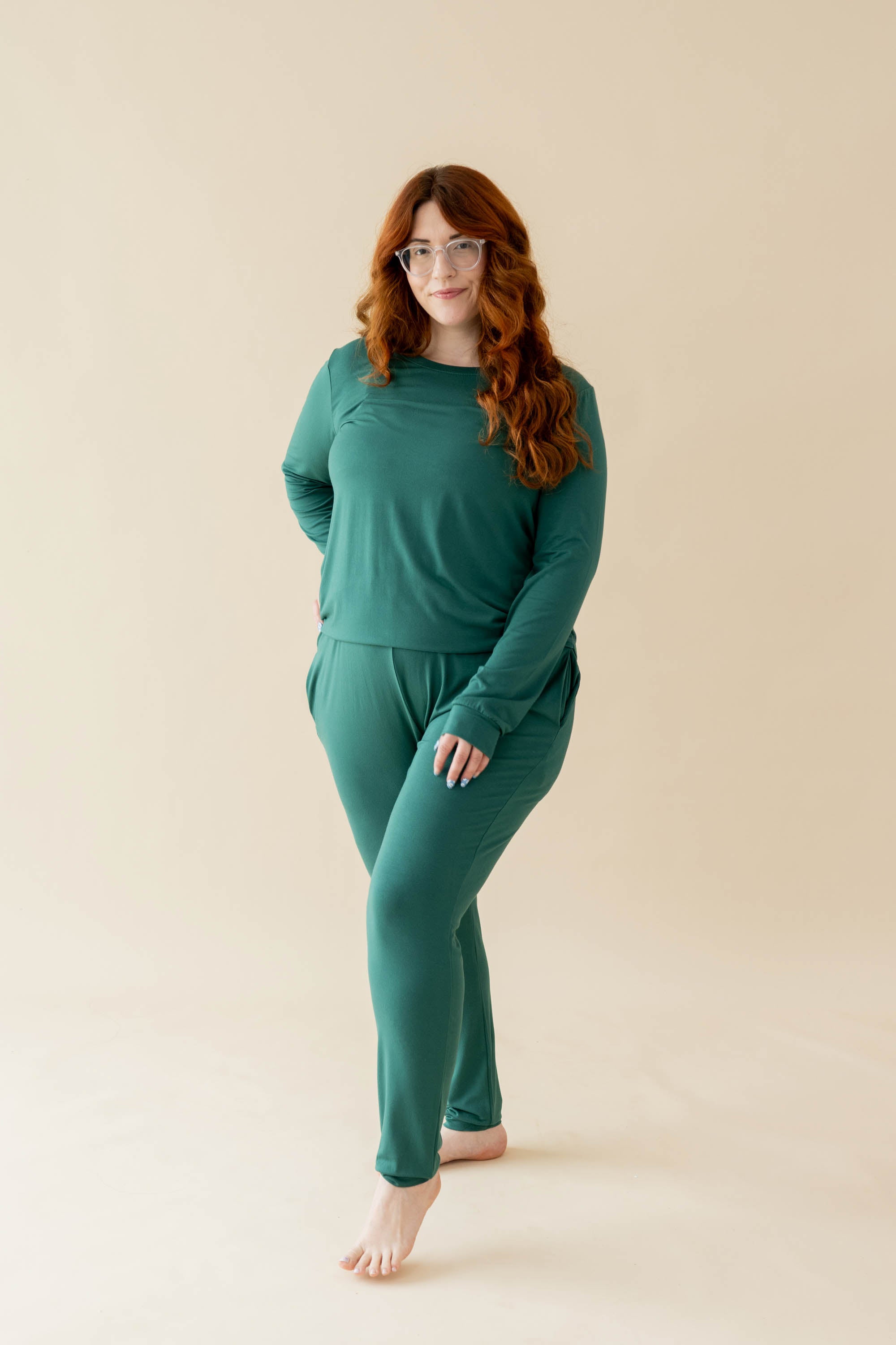 Full length photo of female model wearing the Women's Jogger Pajama Set in Emerald