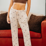 Model wearing the Bamboo Women's Lounge Pants in Espresso Martini paired with bra in Espresso