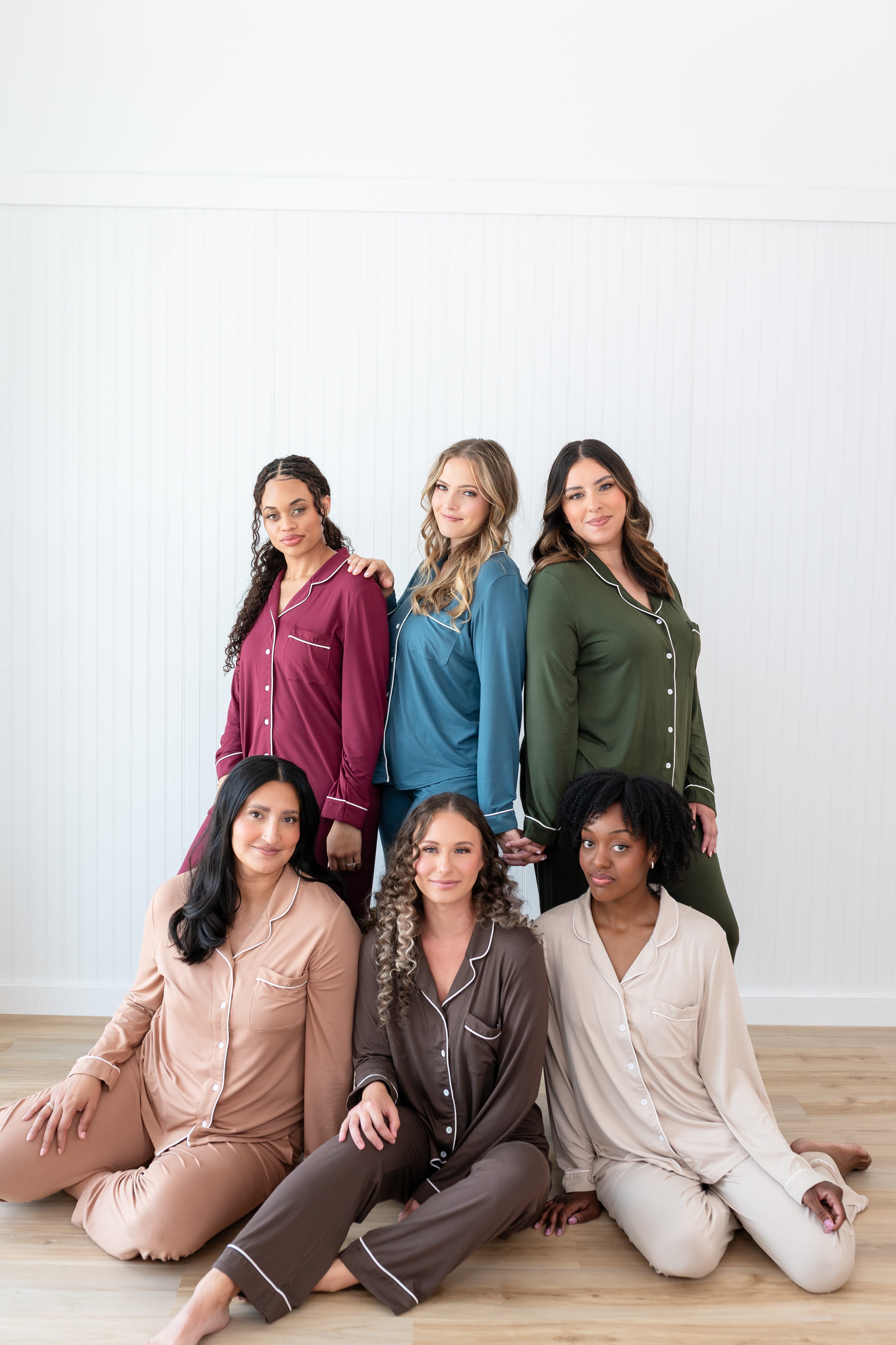 Models wearing Women's Long Sleeve Pajamas in Burgundy, Atlantic, Fir, Latte, Espresso, and Bisque