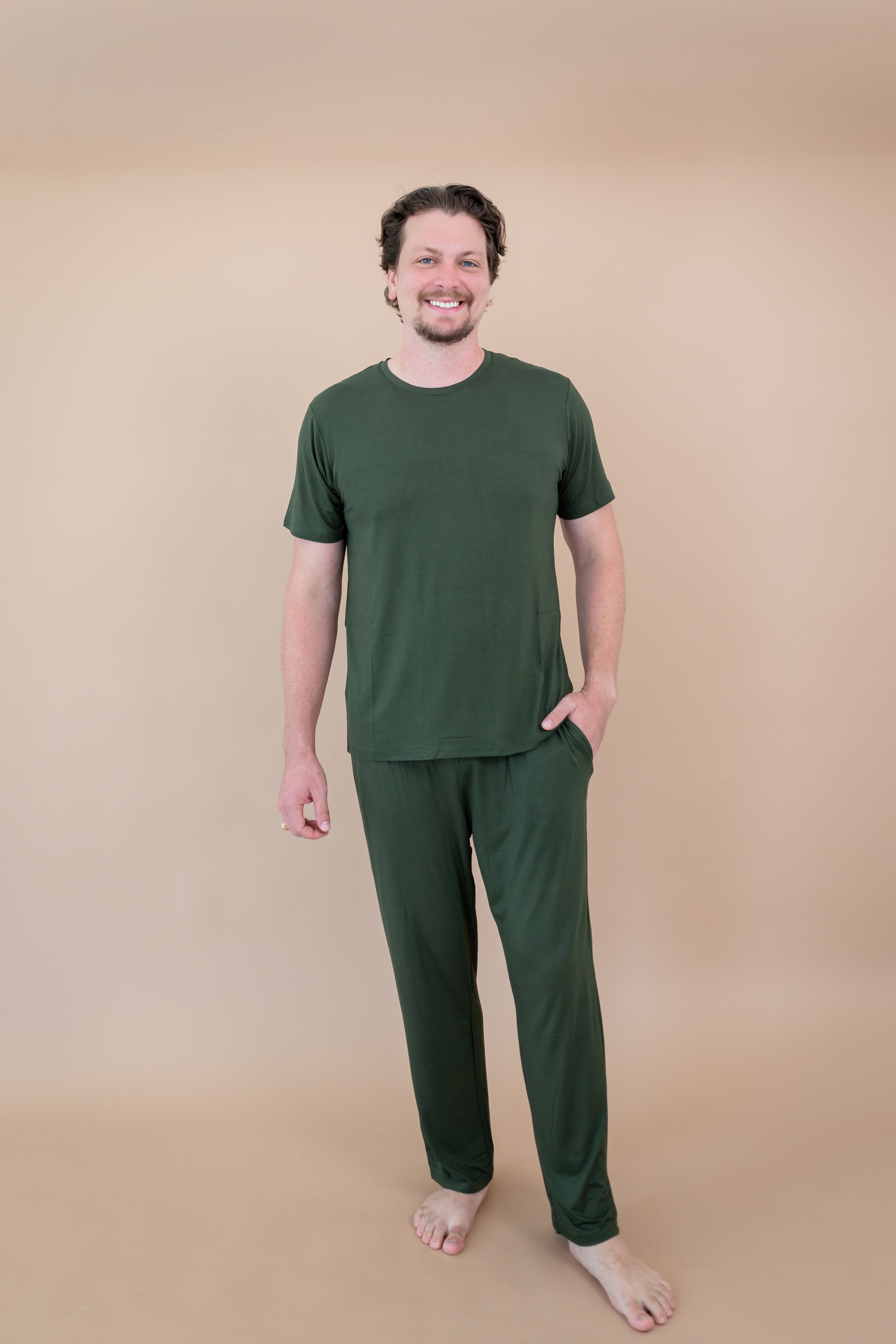 Male model wearing the Kyte Men's Lounge Pants in Fir
