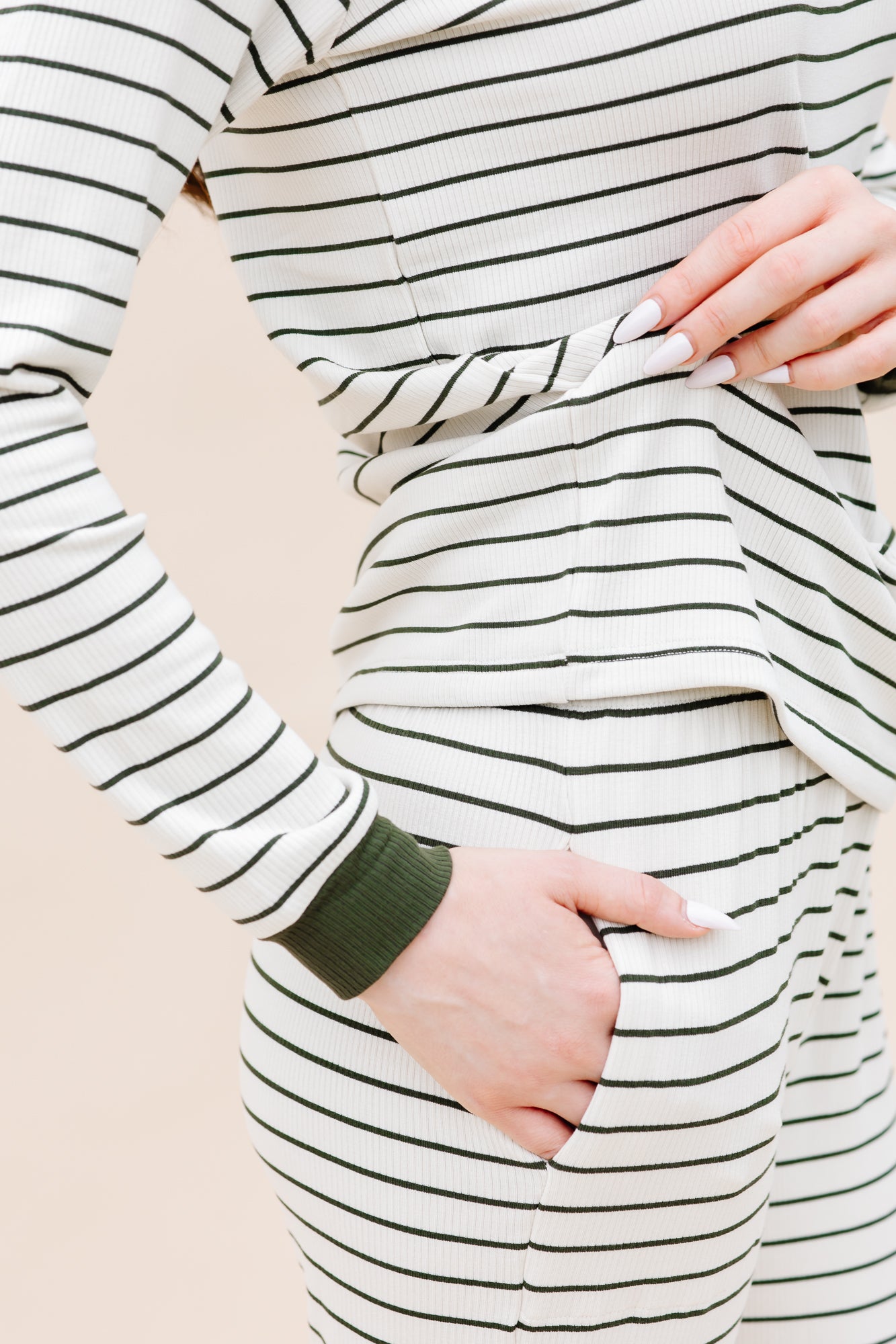 Close up of the solid cuffs and pocket on the bottoms of the Women’s Ribbed Henley Set in Fir Stripe