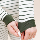 Close up of the solid cuffs on the top of the Women’s Ribbed Henley Set in Fir Stripe