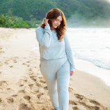 Model walking in the sand wearing the Women's Jogger Pajama Set in Fog