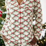 Close up of the top of the Kyte Bamboo Long-Sleeved Women's Pajama Set in Holiday Bow