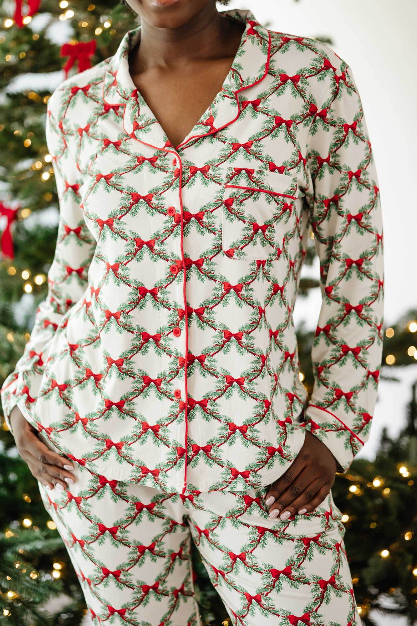 Close up of the top of the Kyte Bamboo Long-Sleeved Women's Pajama Set in Holiday Bow