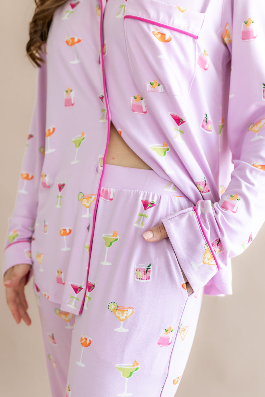 Close up of the unbuttoned top and waistband of the bottoms from the Long-Sleeved Women's Pajama Set in Cocktail