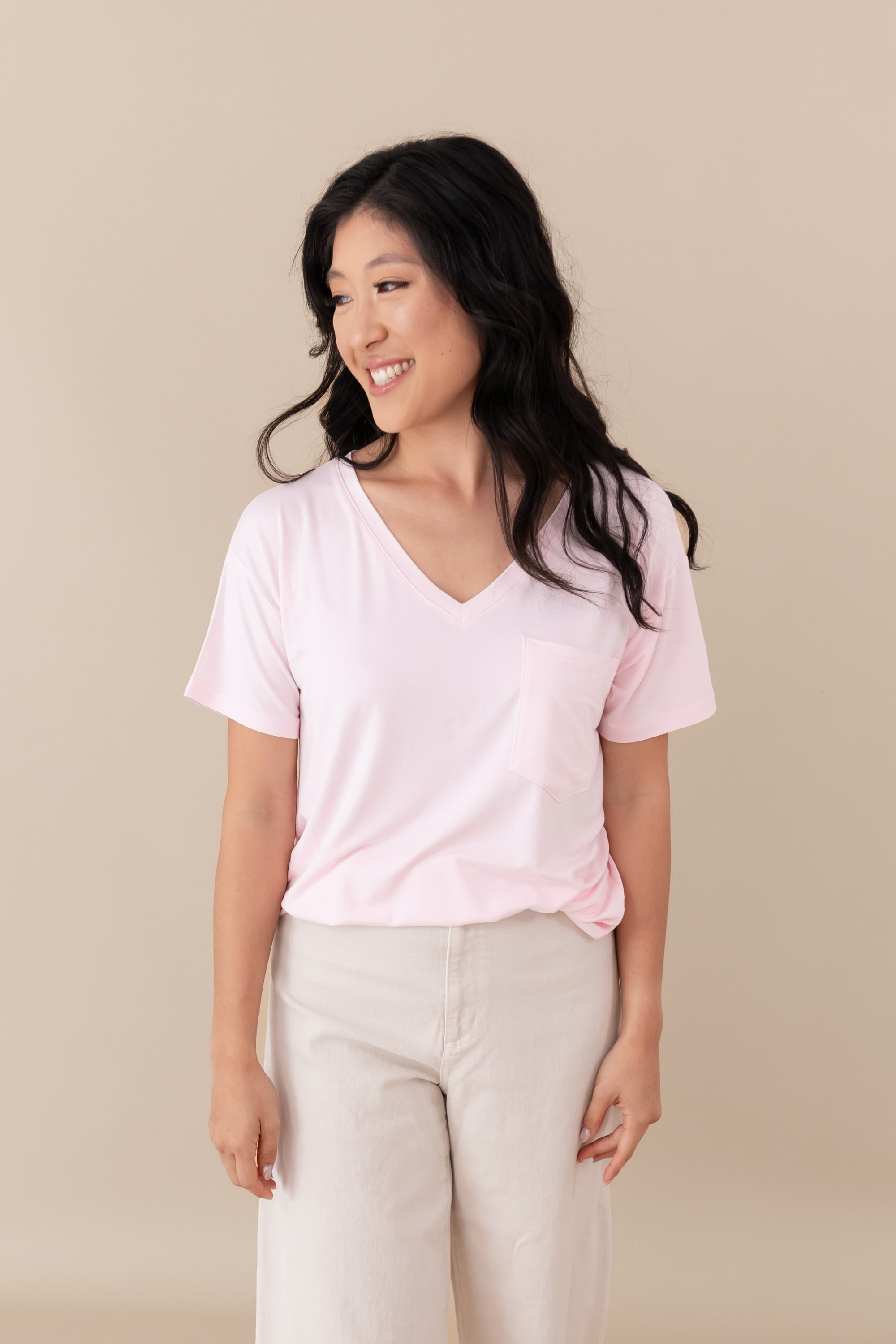 woman modeling Women’s Relaxed Fit V-Neck in Sakura
