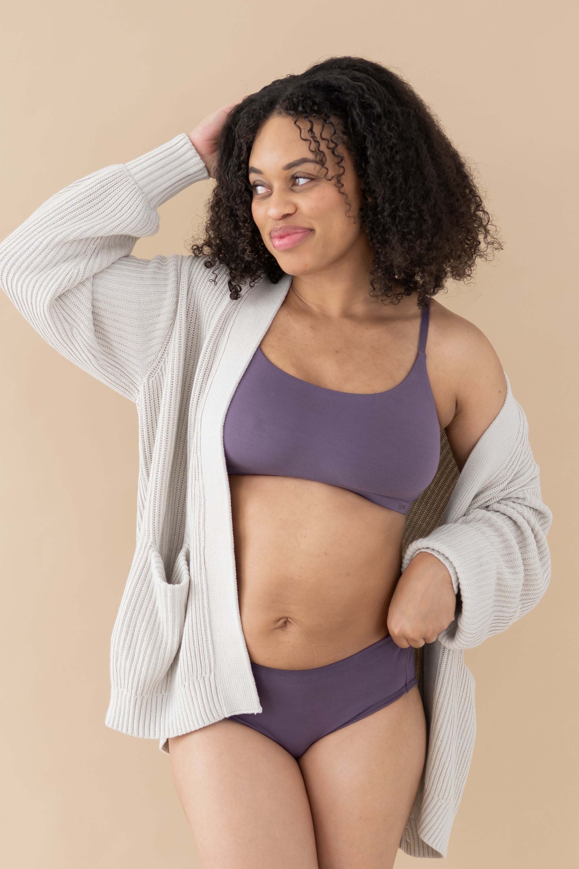 Woman wearing Currant Bralette, Briefs and Chunky Knit Women's Oversized Cardigan in Oat