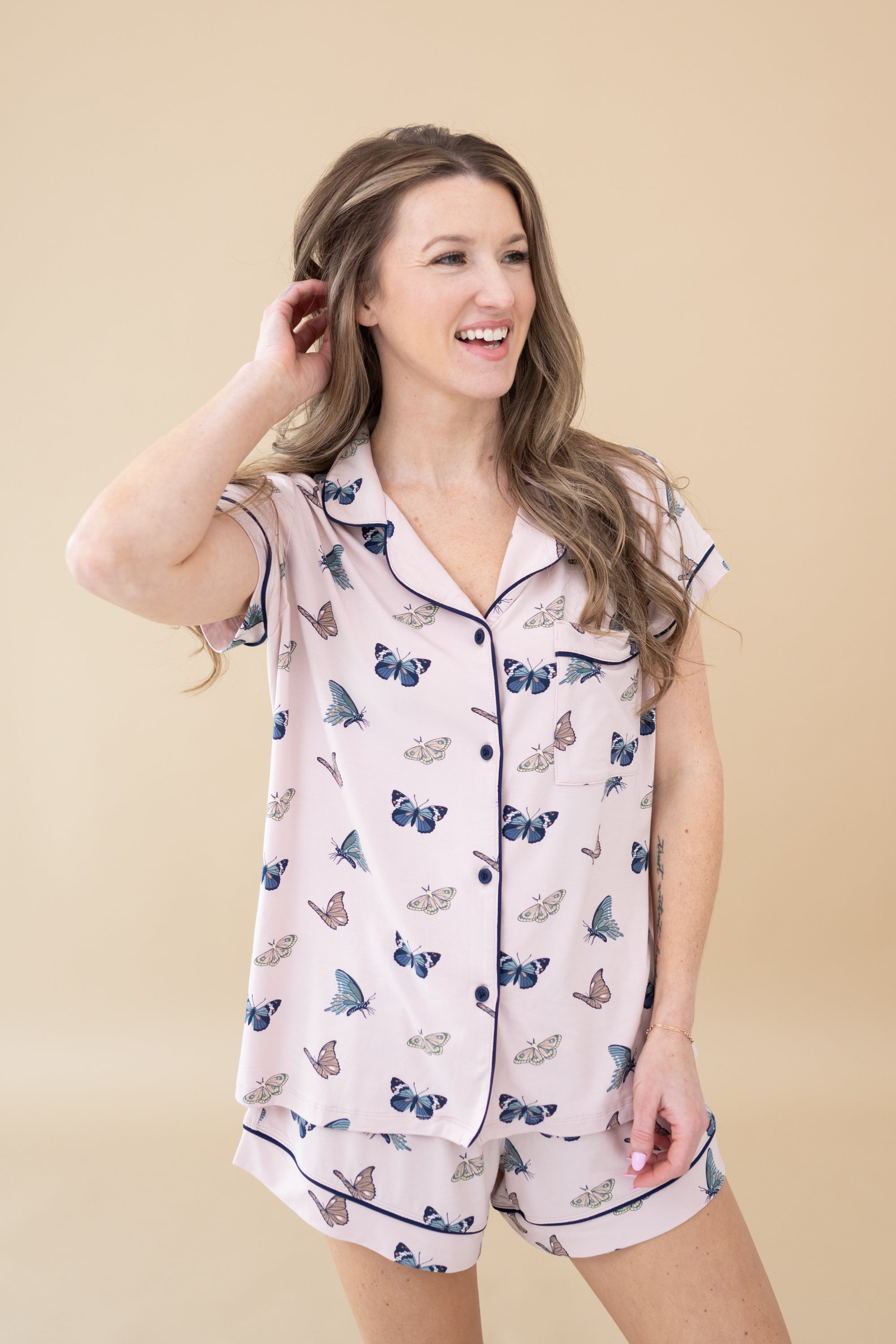 Female modeling the Women's Short Sleeve Pajama Set in Butterfly