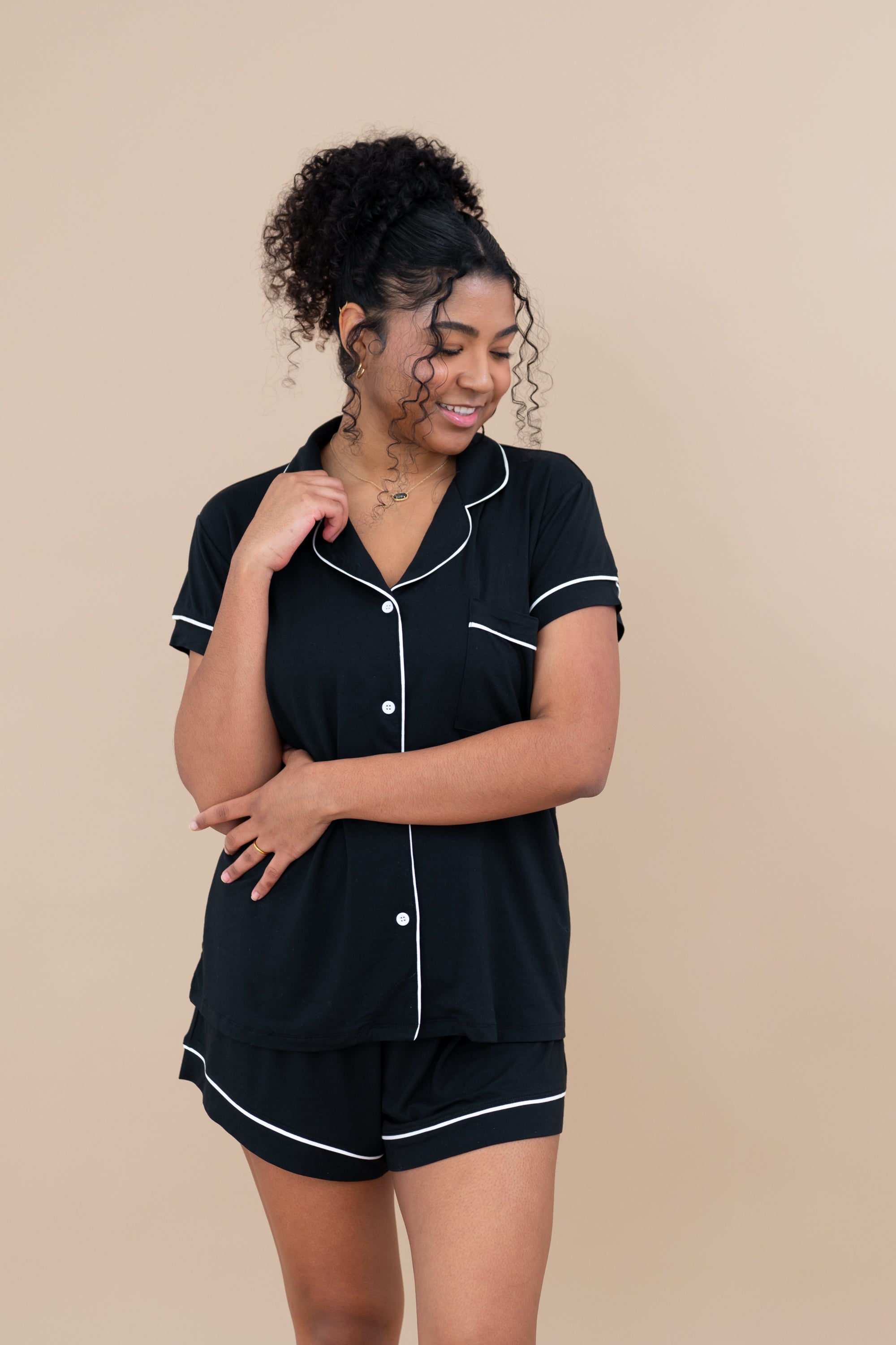 Female model in Women's Short Sleeve Pajama Set in Midnight with Cloud Trim