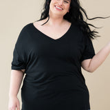 Female model wearing the Women’s Relaxed Fit V-Neck in Midnight