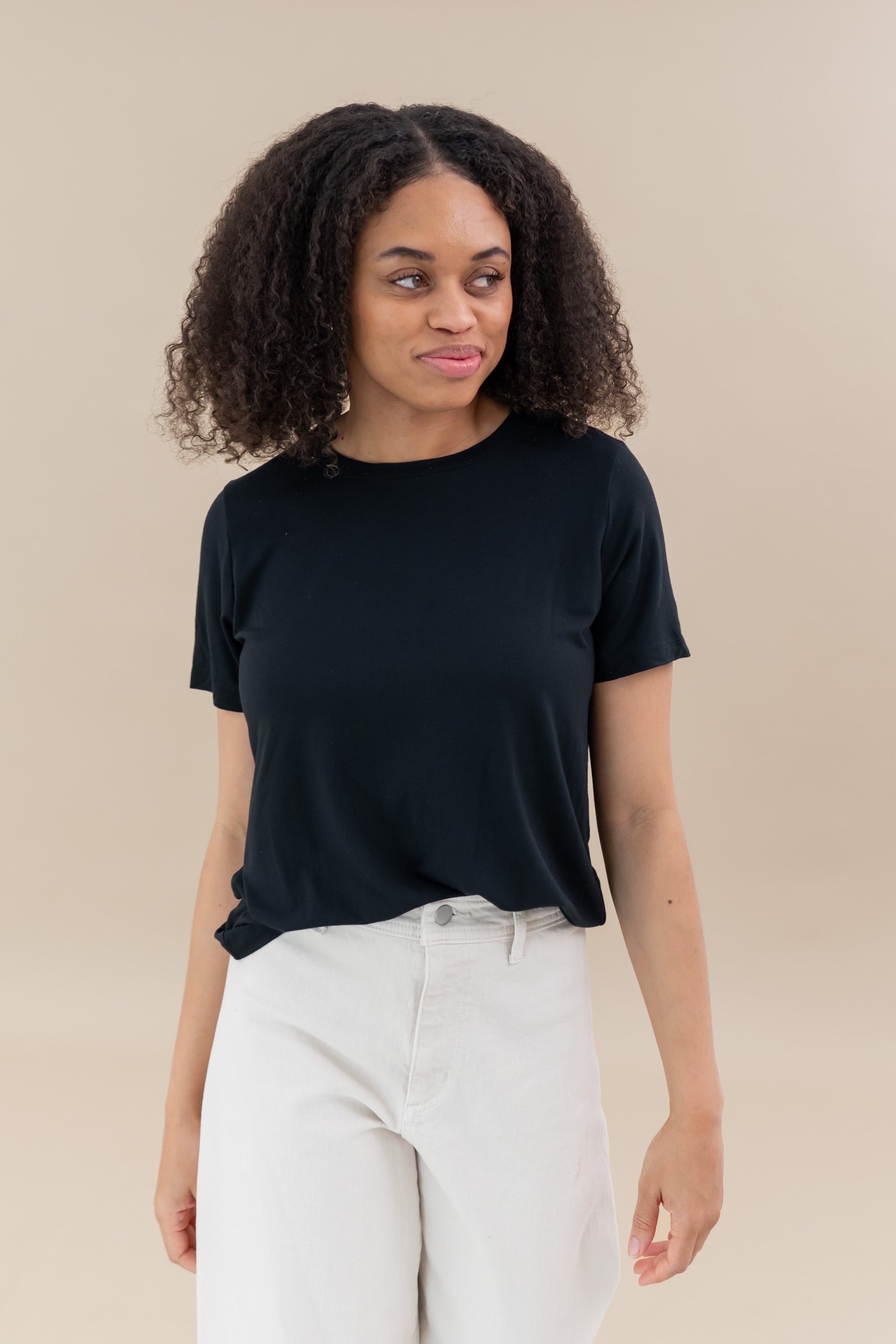 Female wearing the Women's Crew Neck Tee in Midnight