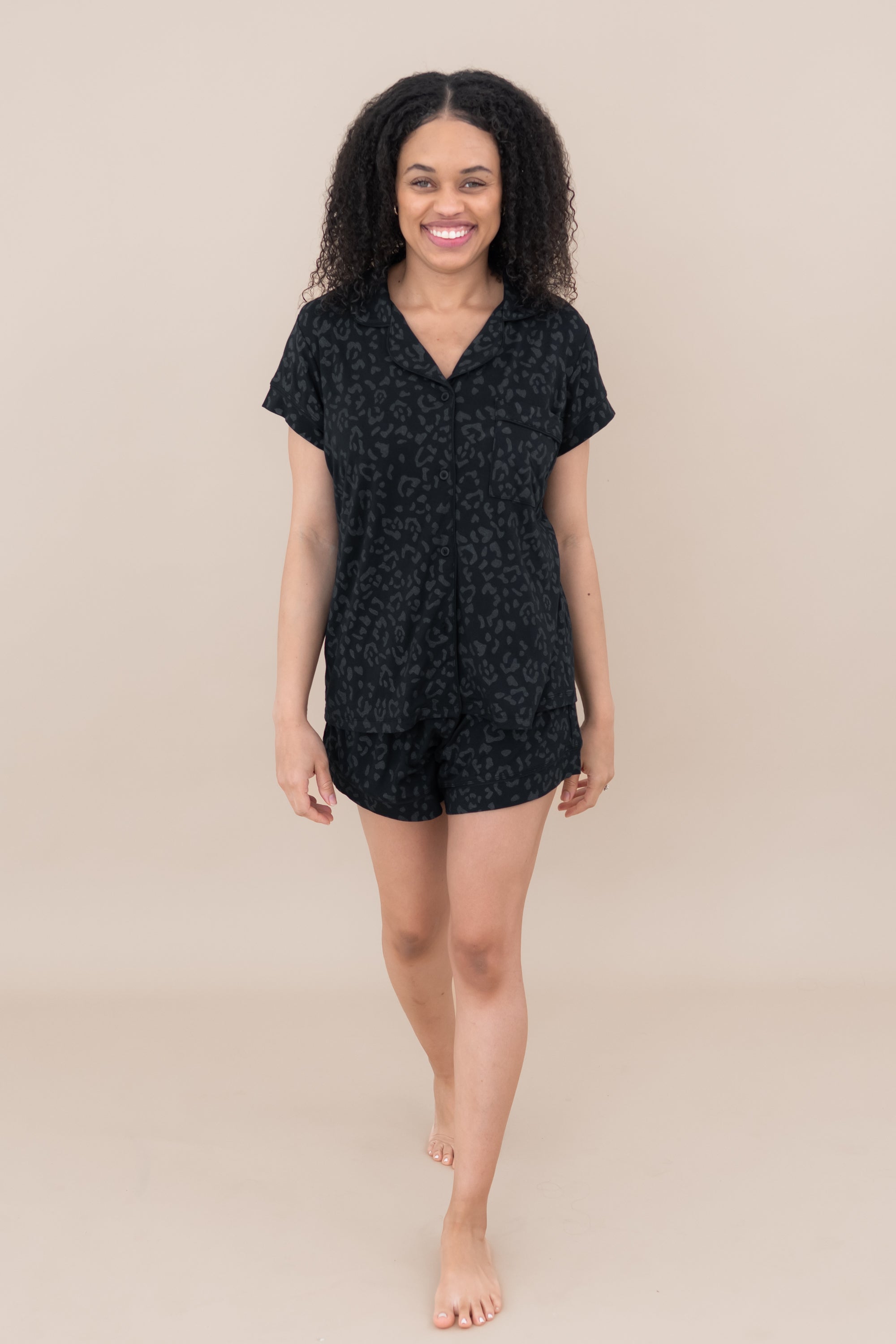 Woman modeling Women’s Short Sleeve Pajama Set in Midnight Leopard
