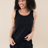 Female model wearing the Women’s Tank Set in Midnight