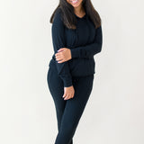 Woman modeling Women's Ribbed Hoodie in Midnight and matching jogger pant