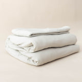 Kyte Baby's Fitted Sheet with Pillowcases in Oat