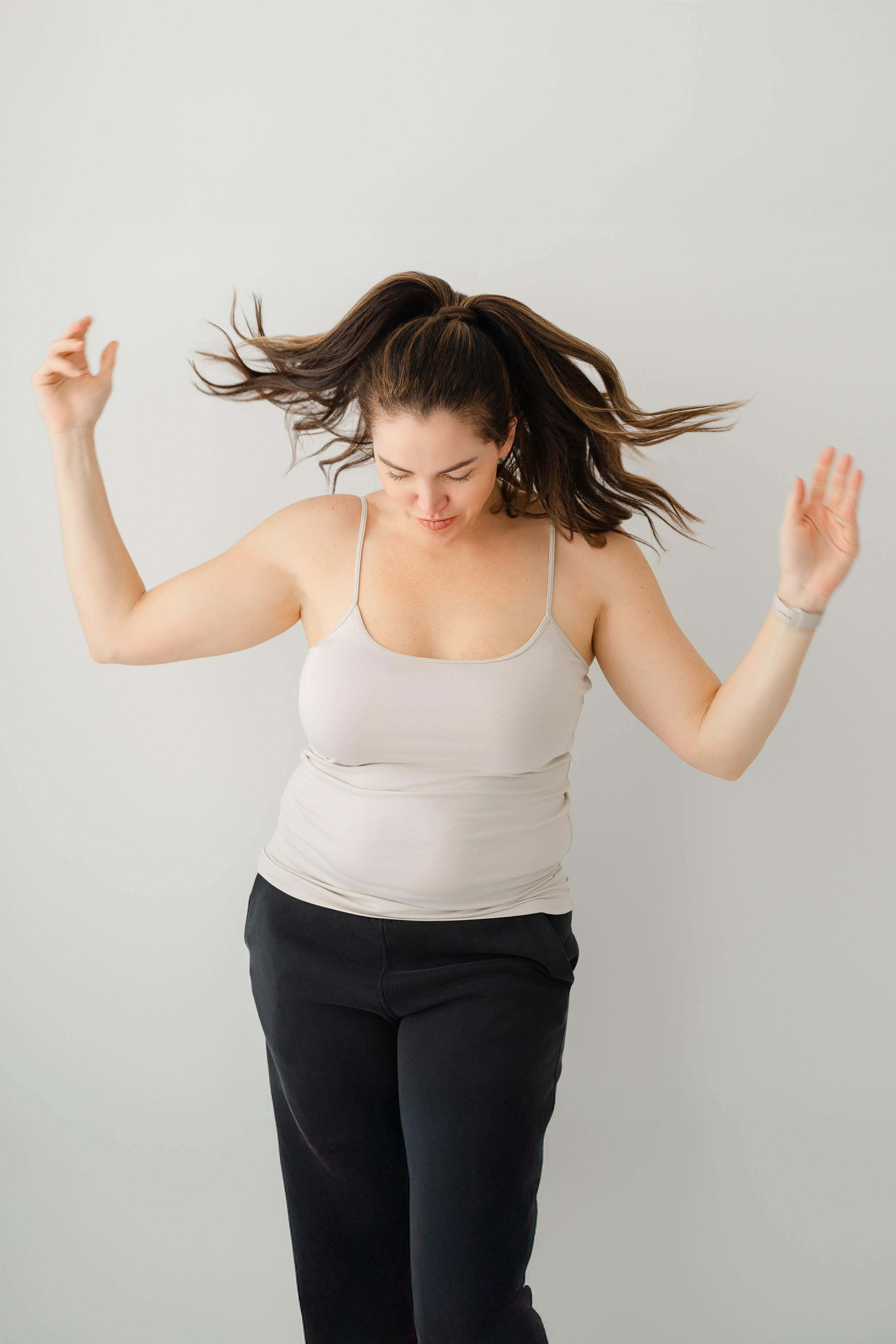 Model in Kyte Baby's Women’s Camisole in Oat