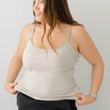 Model wearing the Women’s Camisole in Oat paired with Black pants