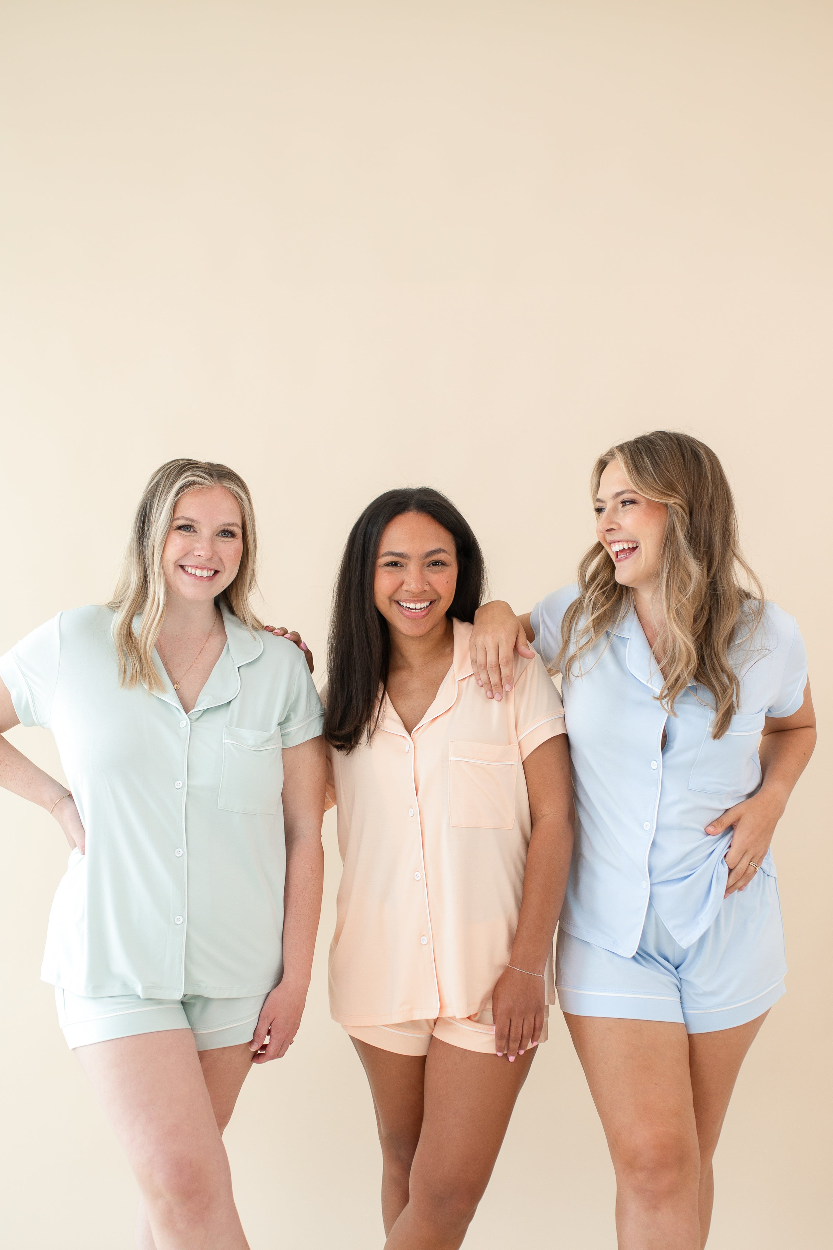3 women modeling Women's Short Sleeve Pajama Sets in Mist, Canyon and Dew