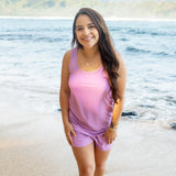 Female model in the sand at the beach wearing Women’s Tank Set in Poi
