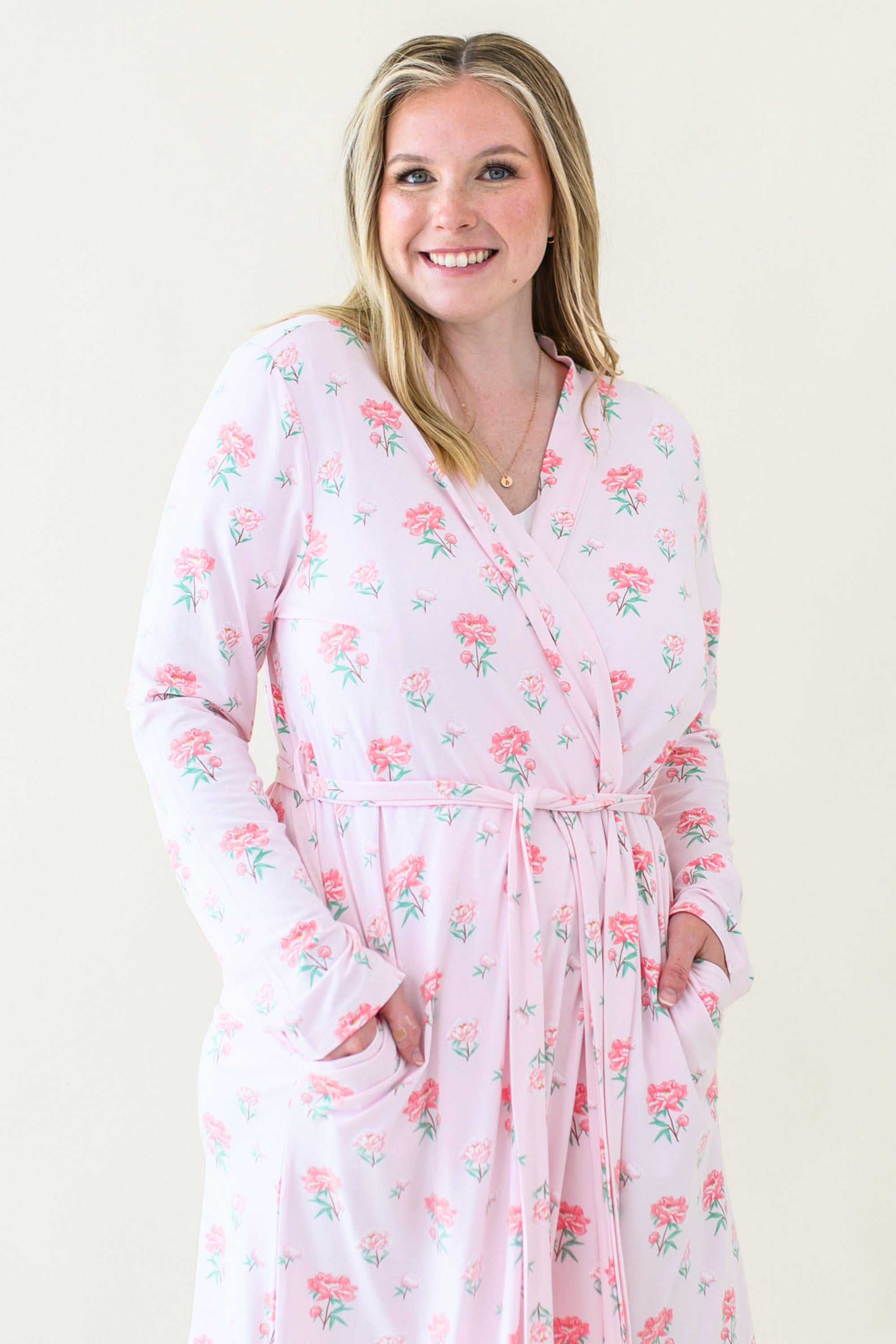 Close up on woman modeling Women's Lounge Robe in Sakura Peony showing front pockets and adjustable waist tie