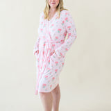 Woman modeling Women's Lounge Robe in Sakura Peony with hands in pockets