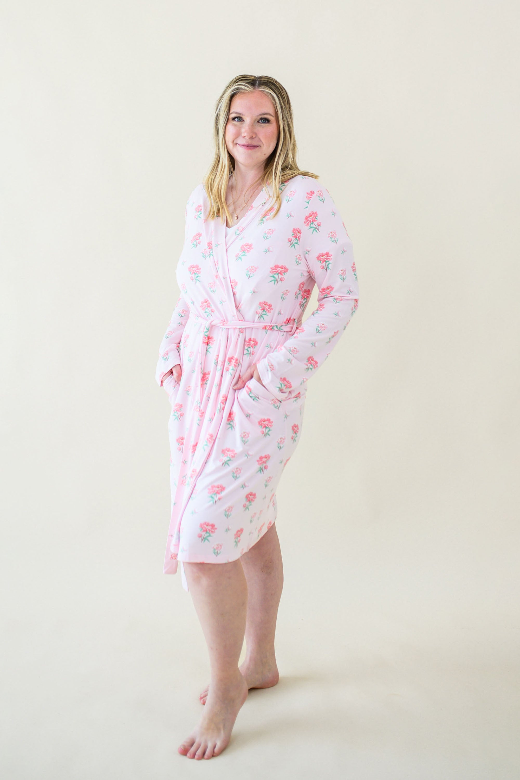 Woman modeling Women's Lounge Robe in Sakura Peony with hands in pockets